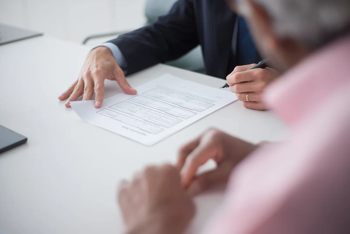 Senior Stakeholder signing document